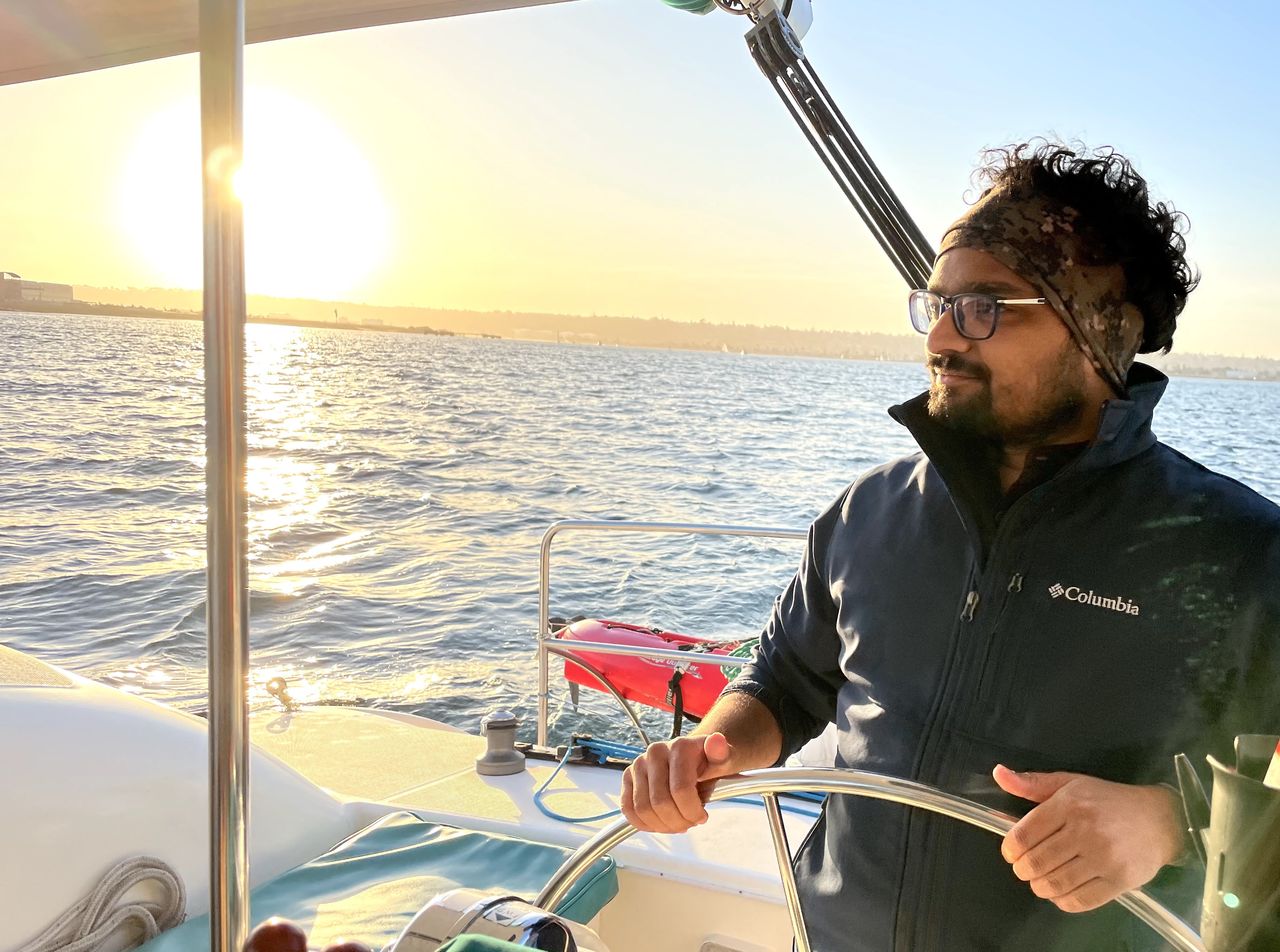 Adventure shot on a boat at sunset